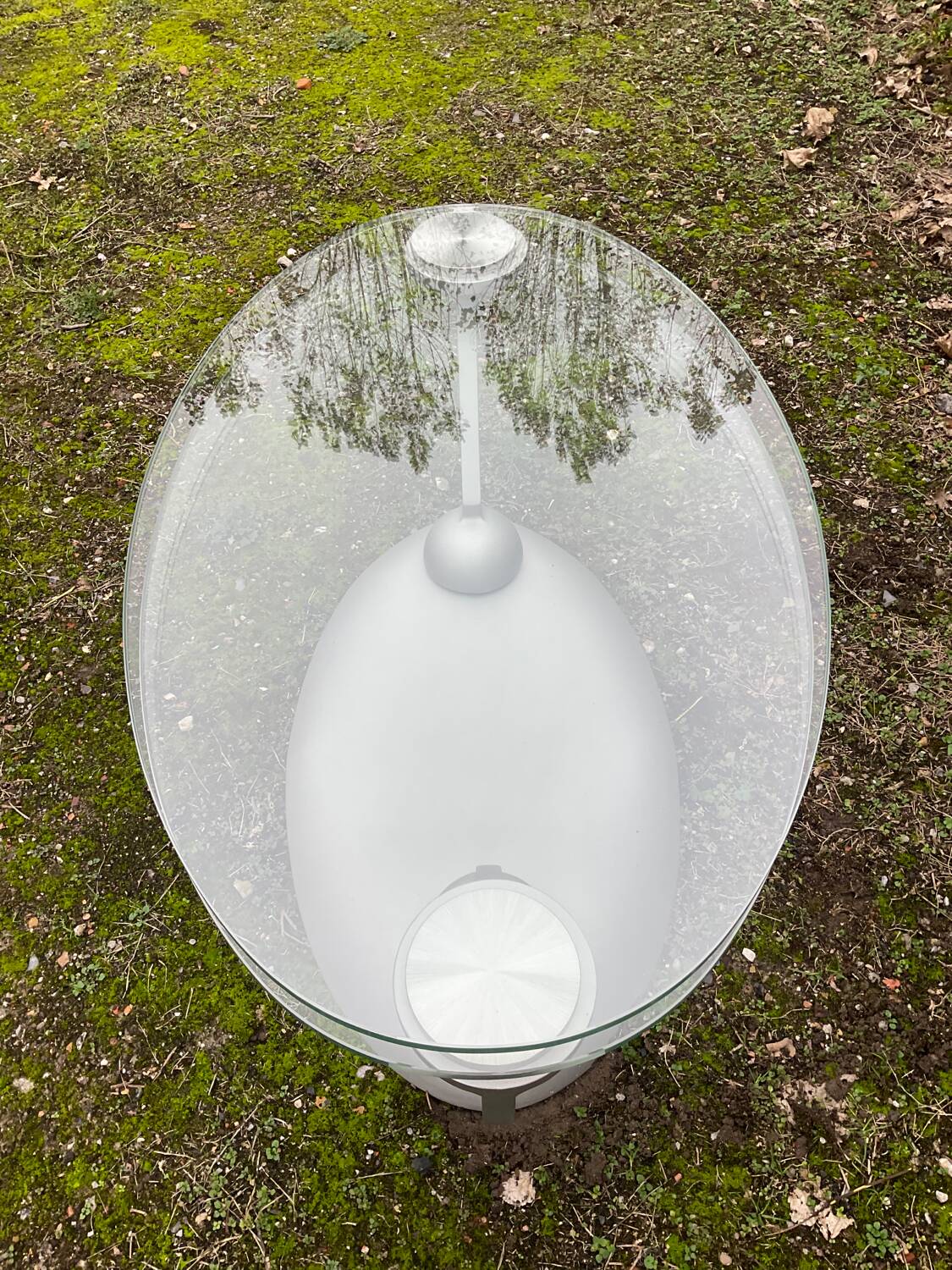 Naos designer coffee table in tempered glass and cast iron