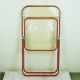 Red Plia Lucite folding chair by G. Piretti for Castelli Italy
