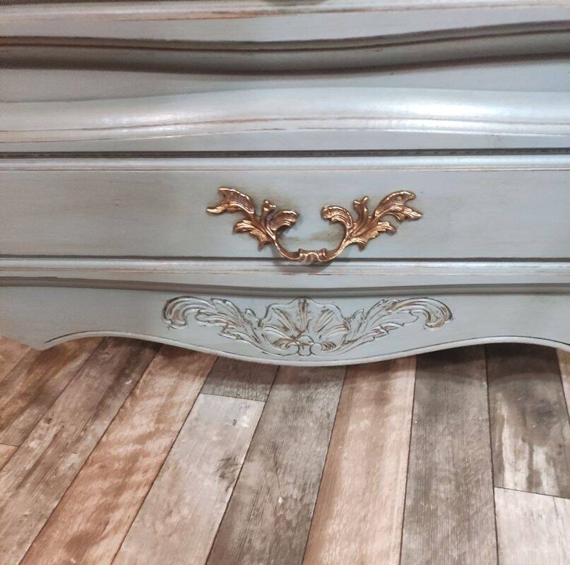 Louis XV style commode with a patina