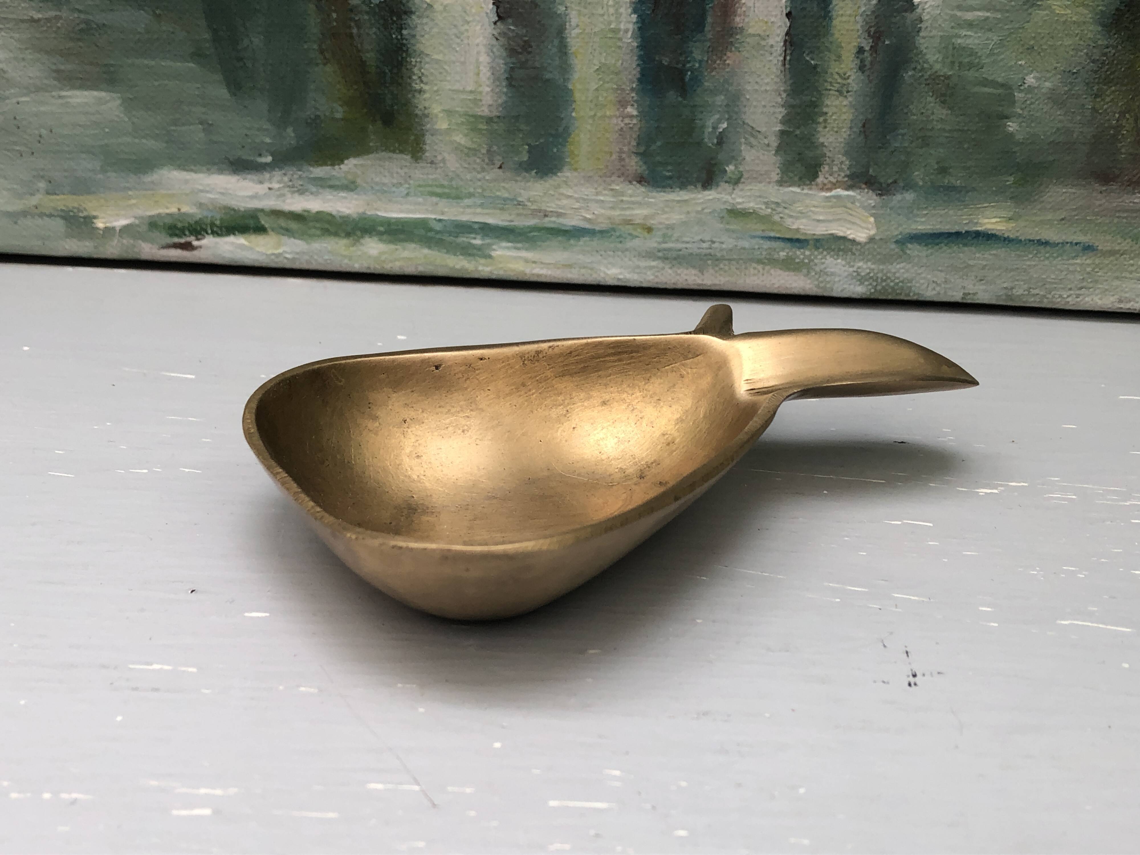 Vintage brass ashtray in the shape of a fruit, pear