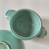 Earthenware bowl and saucer in glazed water green ceramic.