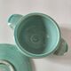 Earthenware bowl and saucer in glazed water green ceramic.