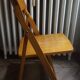 Vintage folding wooden heater chair