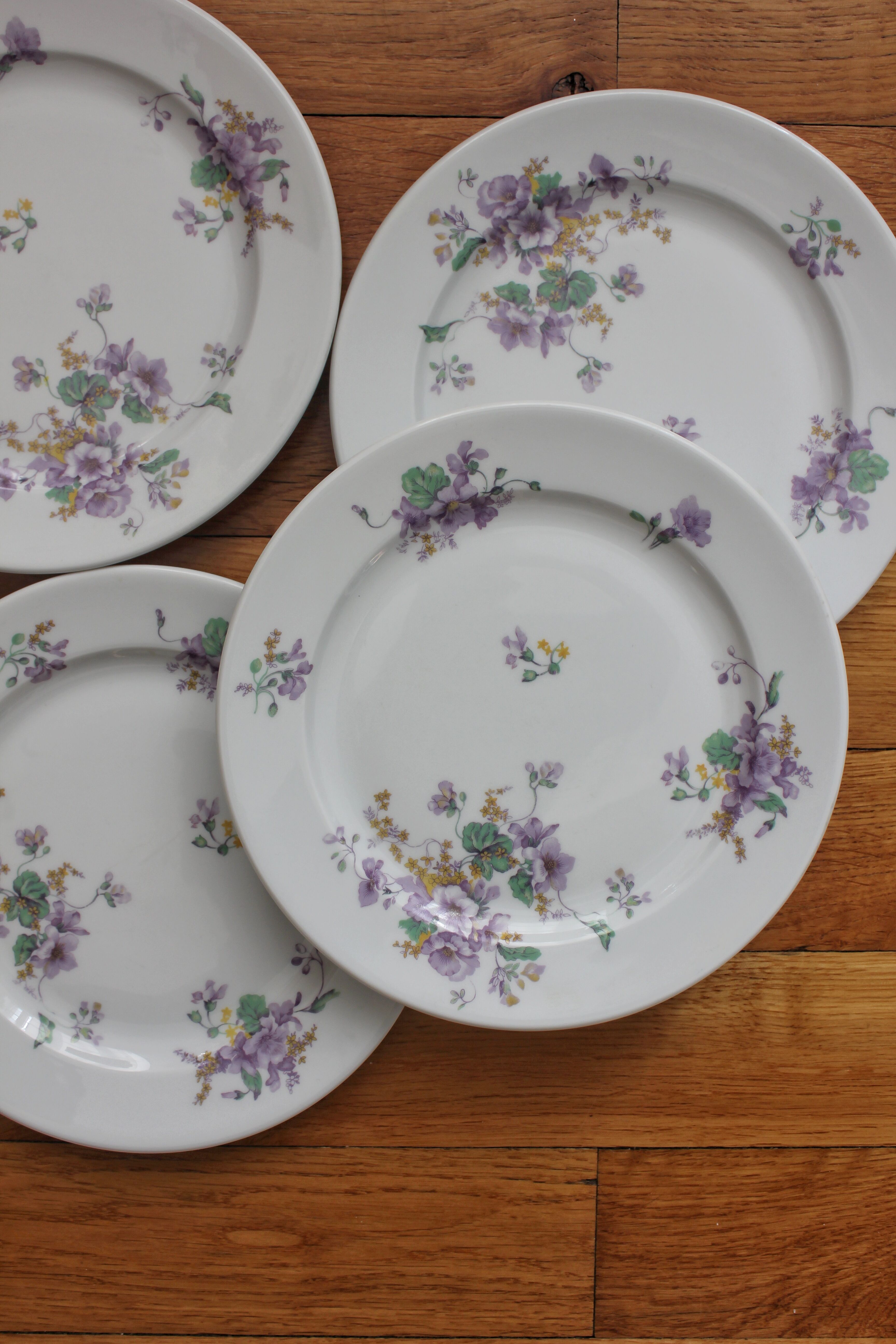 4 porcelain dessert plates decorated with flowers Bernardaud Limoges