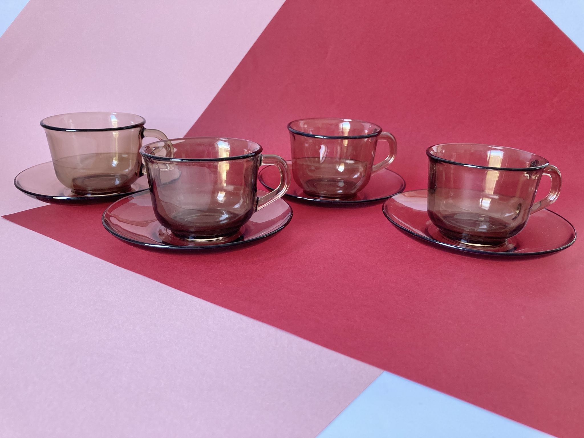 4 Arcoroc coffee cups and saucers in black transparent glass