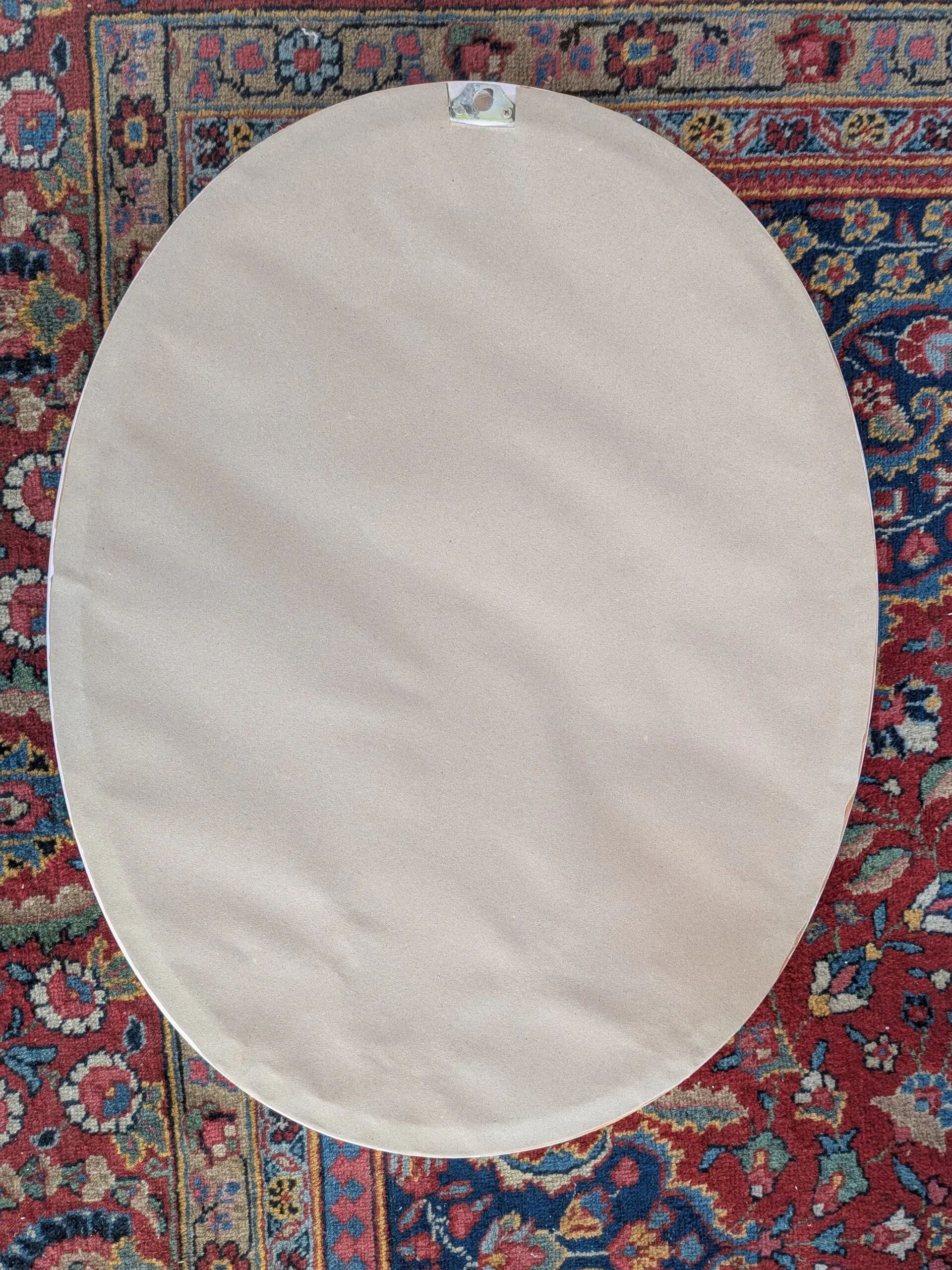 Large oval pink ceramic mirror (76cm) – vintage Italian design