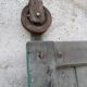 Old wooden door with pulley