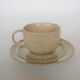 Coffee cup and vintage pyrity sandstone subcup