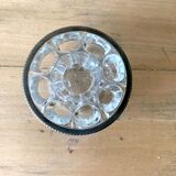 Pique flowers in metal circled glass