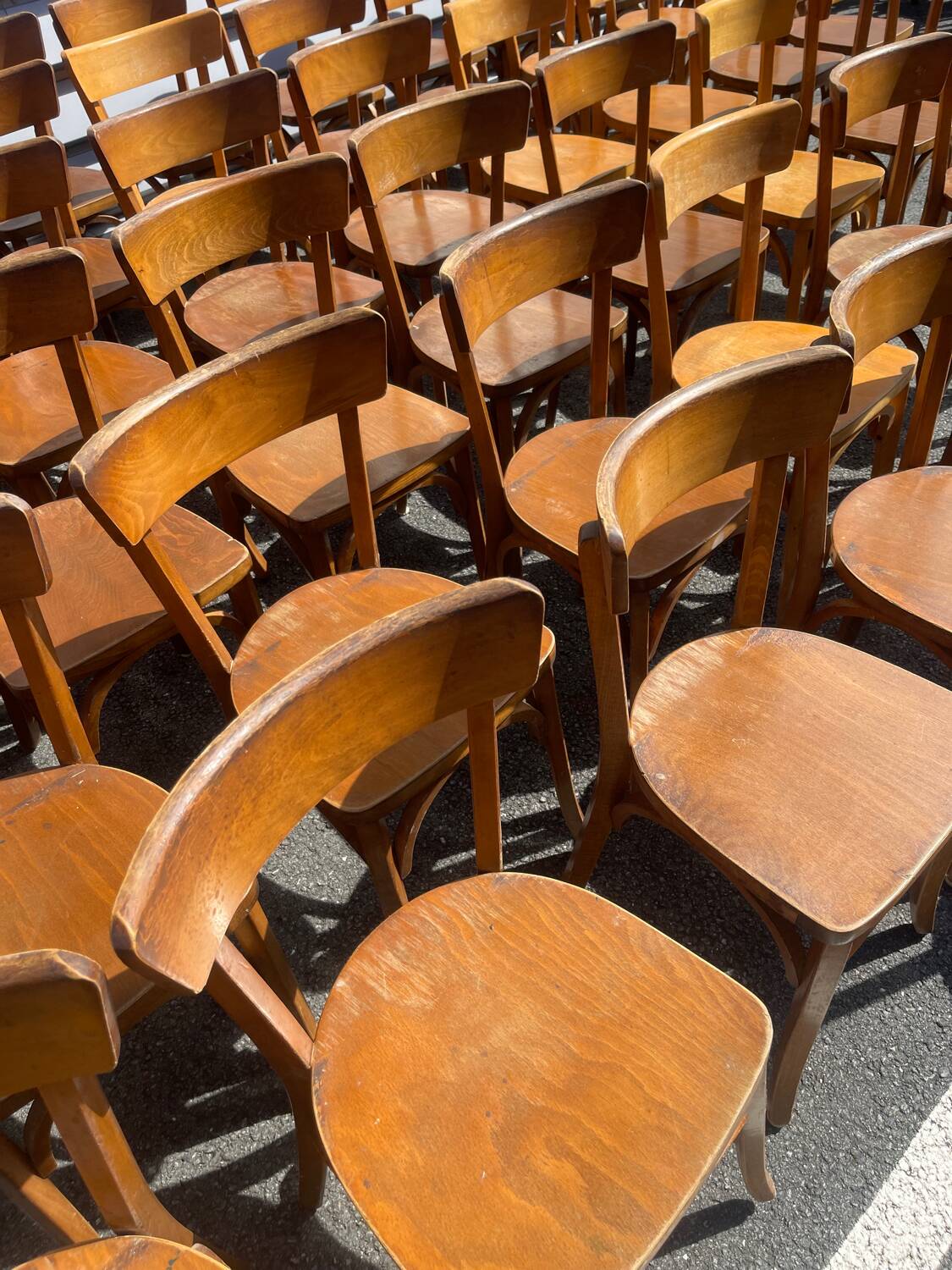 Lot of 60 wooden bistro chairs from the Baumann 1970s