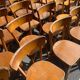Lot of 60 wooden bistro chairs from the Baumann 1970s