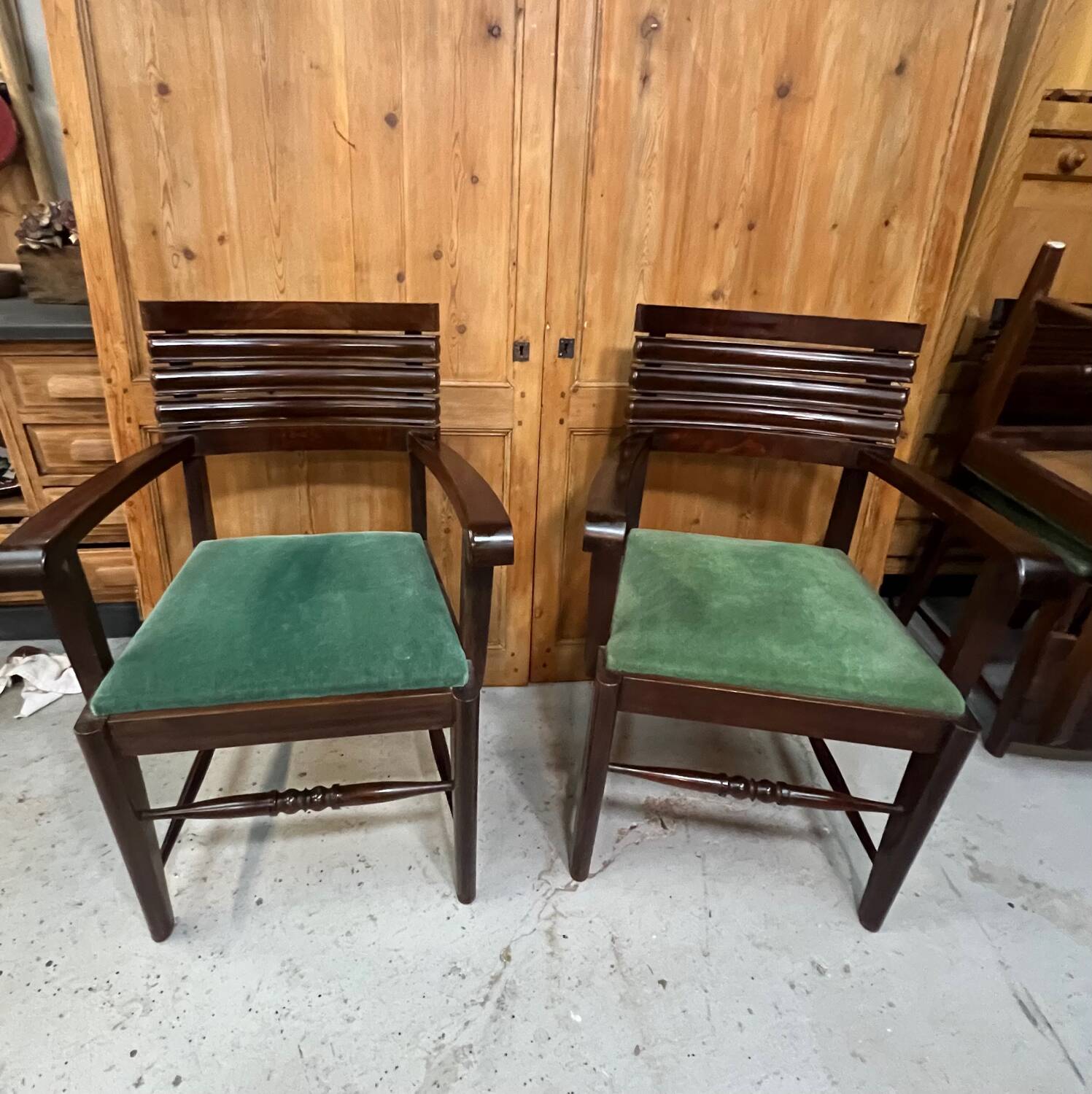 Set of 6 chairs and 2 armchairs by Gaston Poisson