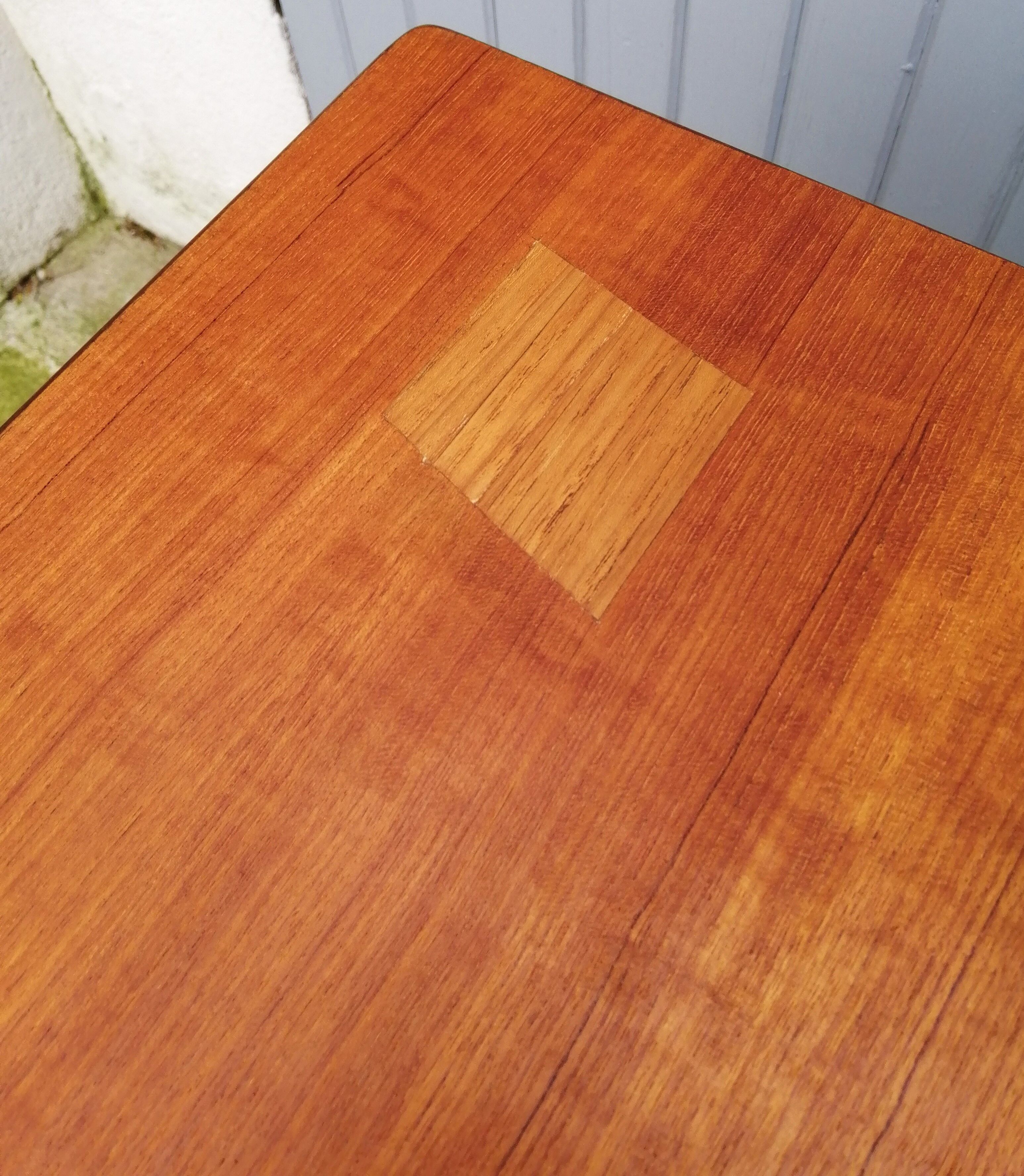 Dining table by Ib Kofod Larsen of the 60s
