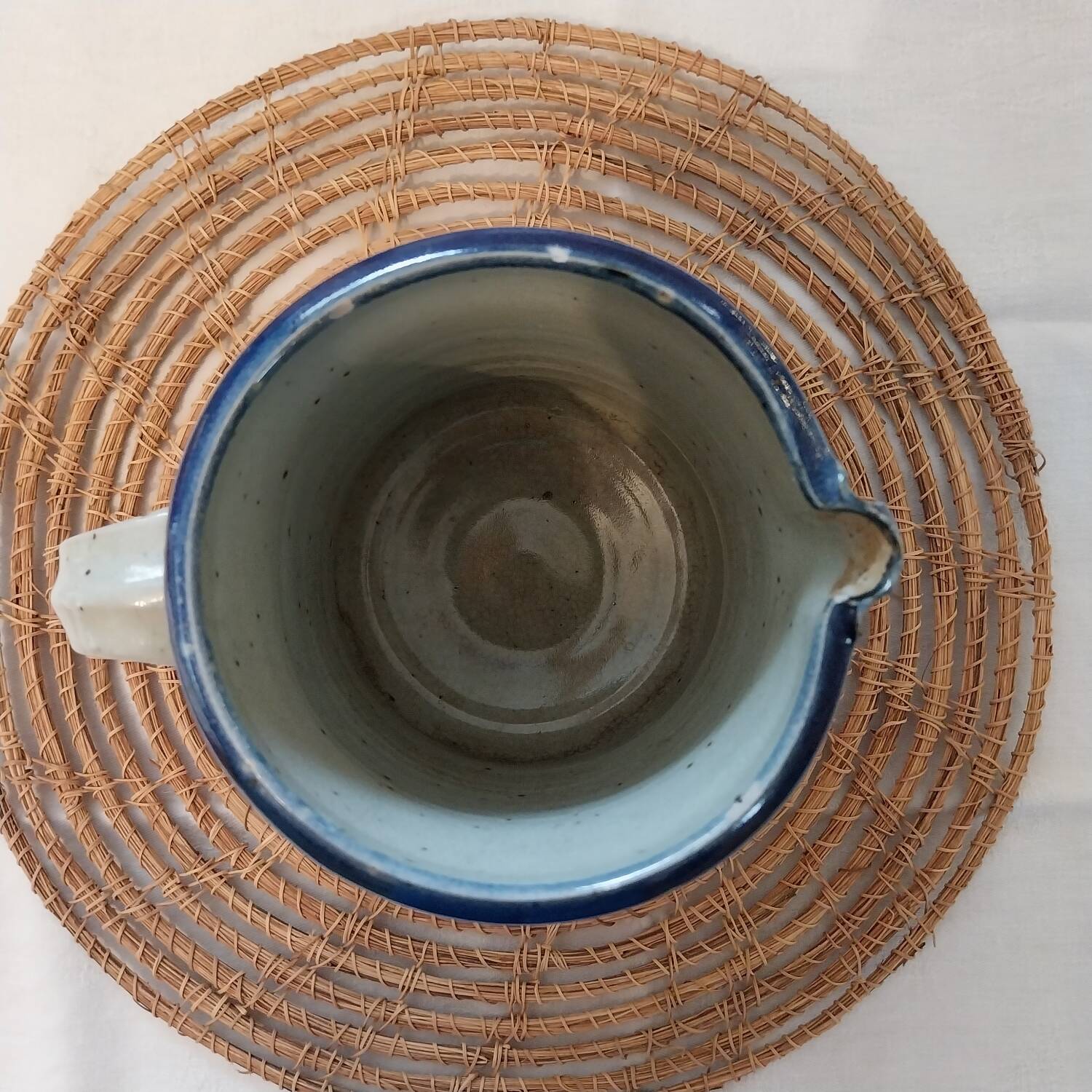 Speckled enamelled stoneware jug signed Christine Robert