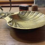 Empty shell pocket in vintage brass