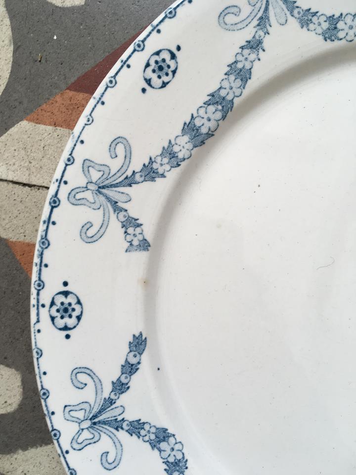 Together six dinner plates old mismatched bluish green.