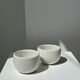 Trio of white ceramic cups D9cm