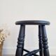 Antique black wooden stool, renovated