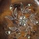 Wooden thuya catchall enhanced with metal wire and mother-of-pearl.