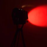 Theatre projector and wooden tripod