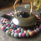 Flat ceramic teapot