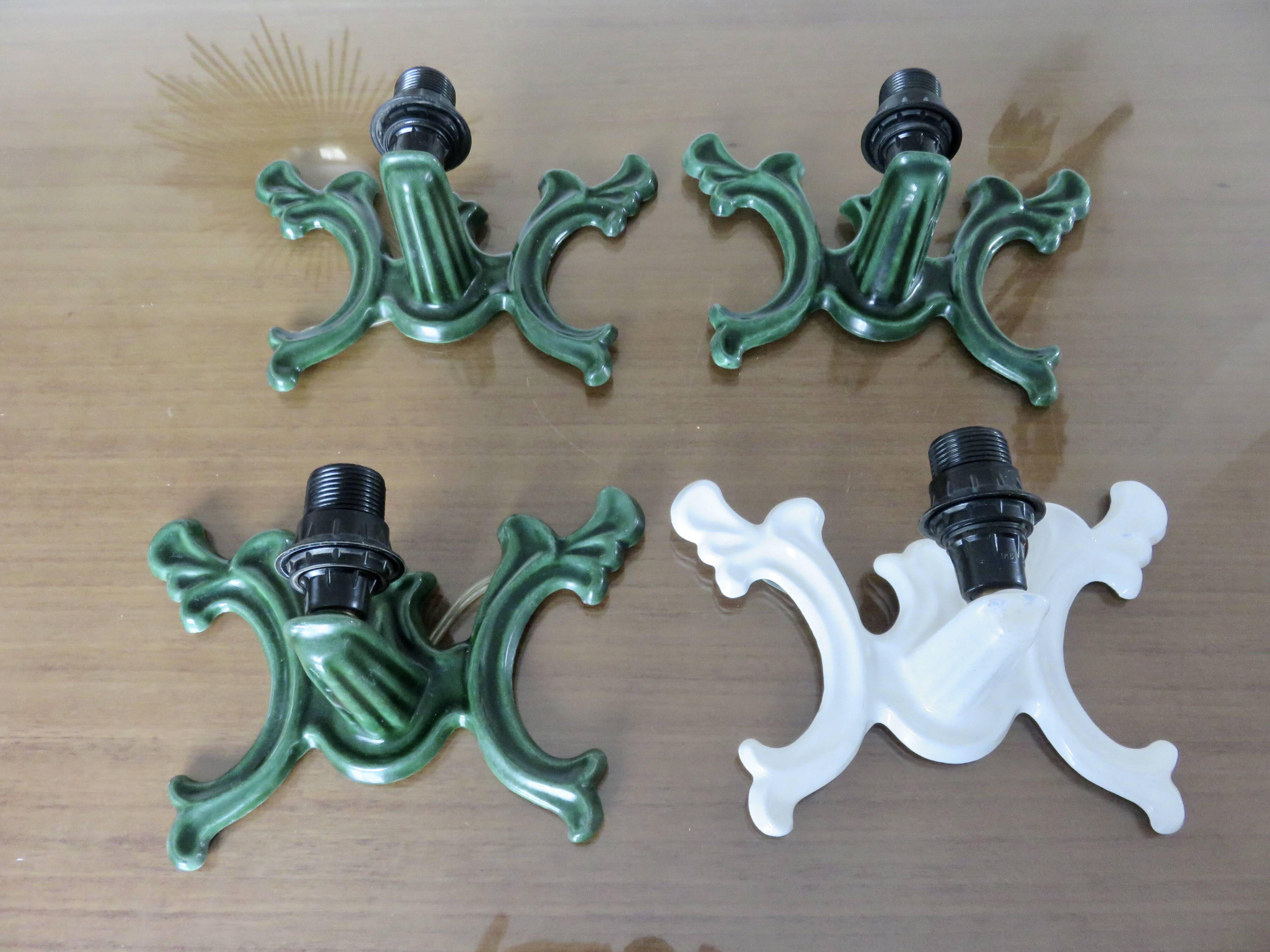 Series of 3 green enameled cast iron wall lights from the 30s and 40s