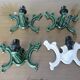 Series of 3 green enameled cast iron wall lights from the 30s and 40s