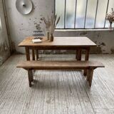 Oak farmhouse table and its two benches