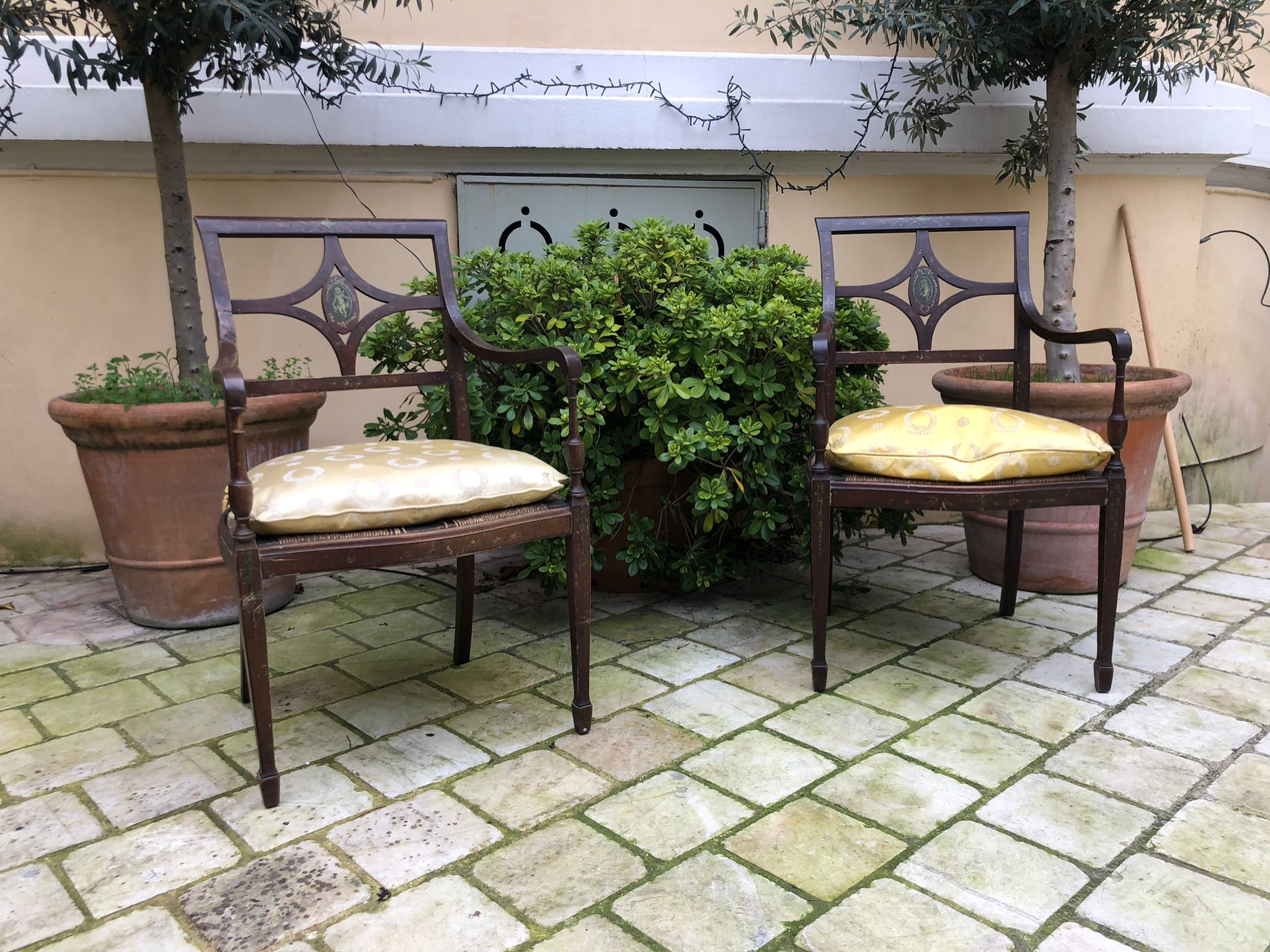 Pair of painted wooden armchairs, nineteenth century