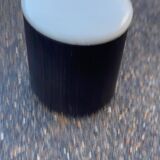 Vintage pouf from the 60s/70s in white and dark brown leather