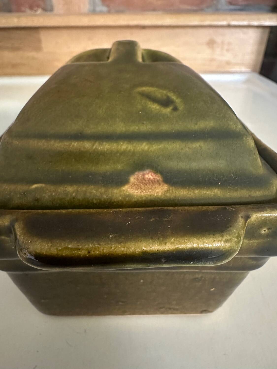Vintage green majolica butter dish