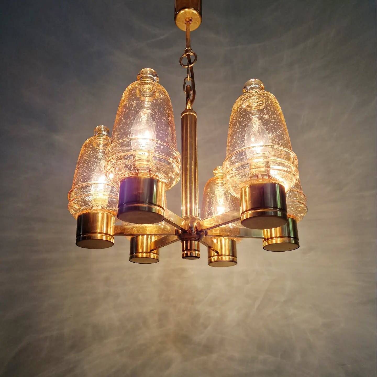 Brass chandelier with amber bubbled glass globes, 1970.