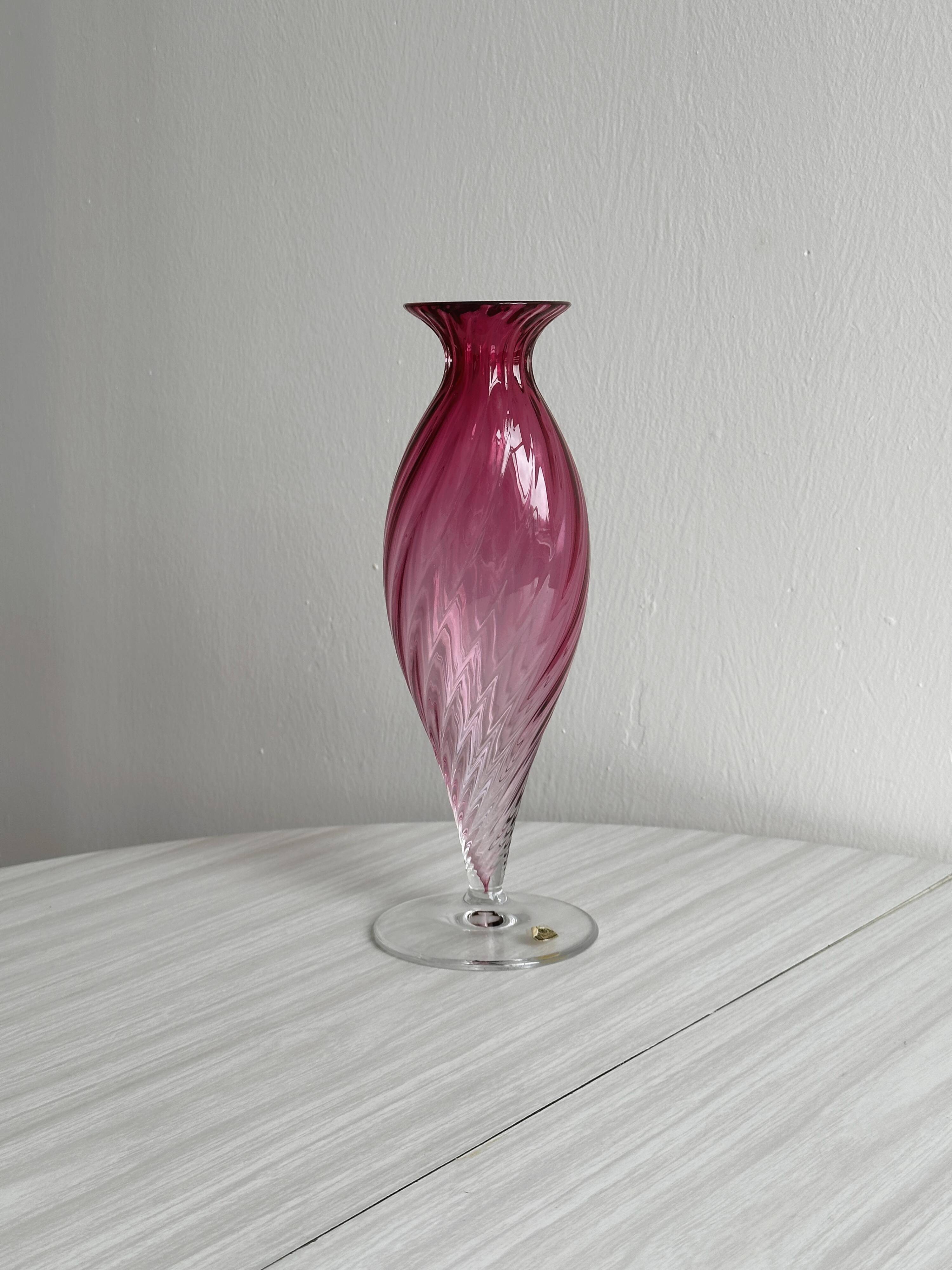 Twisted pink blown glass vase