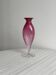 Twisted pink blown glass vase