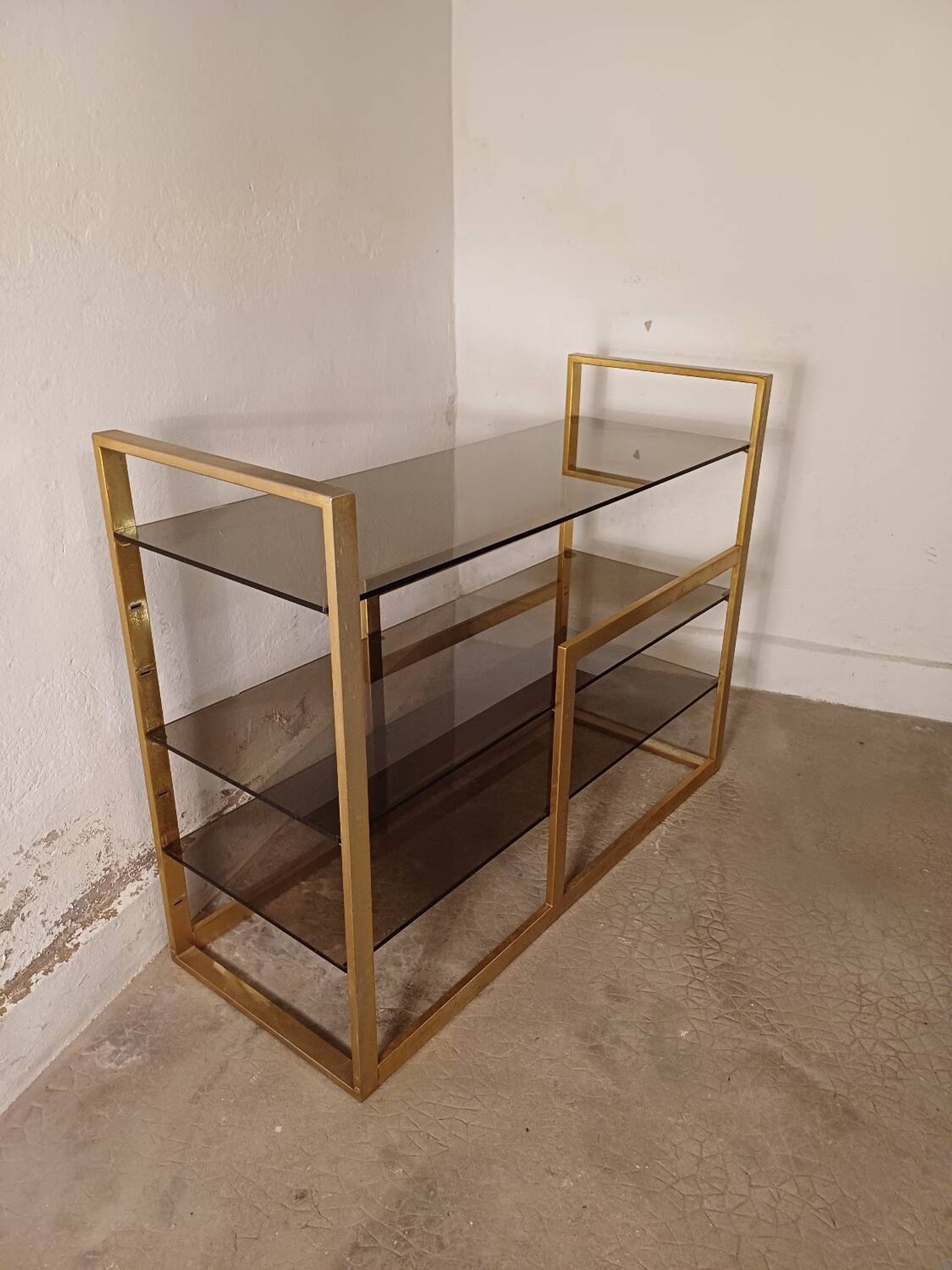 Brass shelf, smoked glass