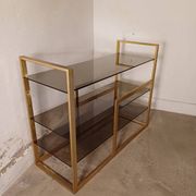 Brass shelf, smoked glass