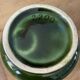 Green ceramic milk jug