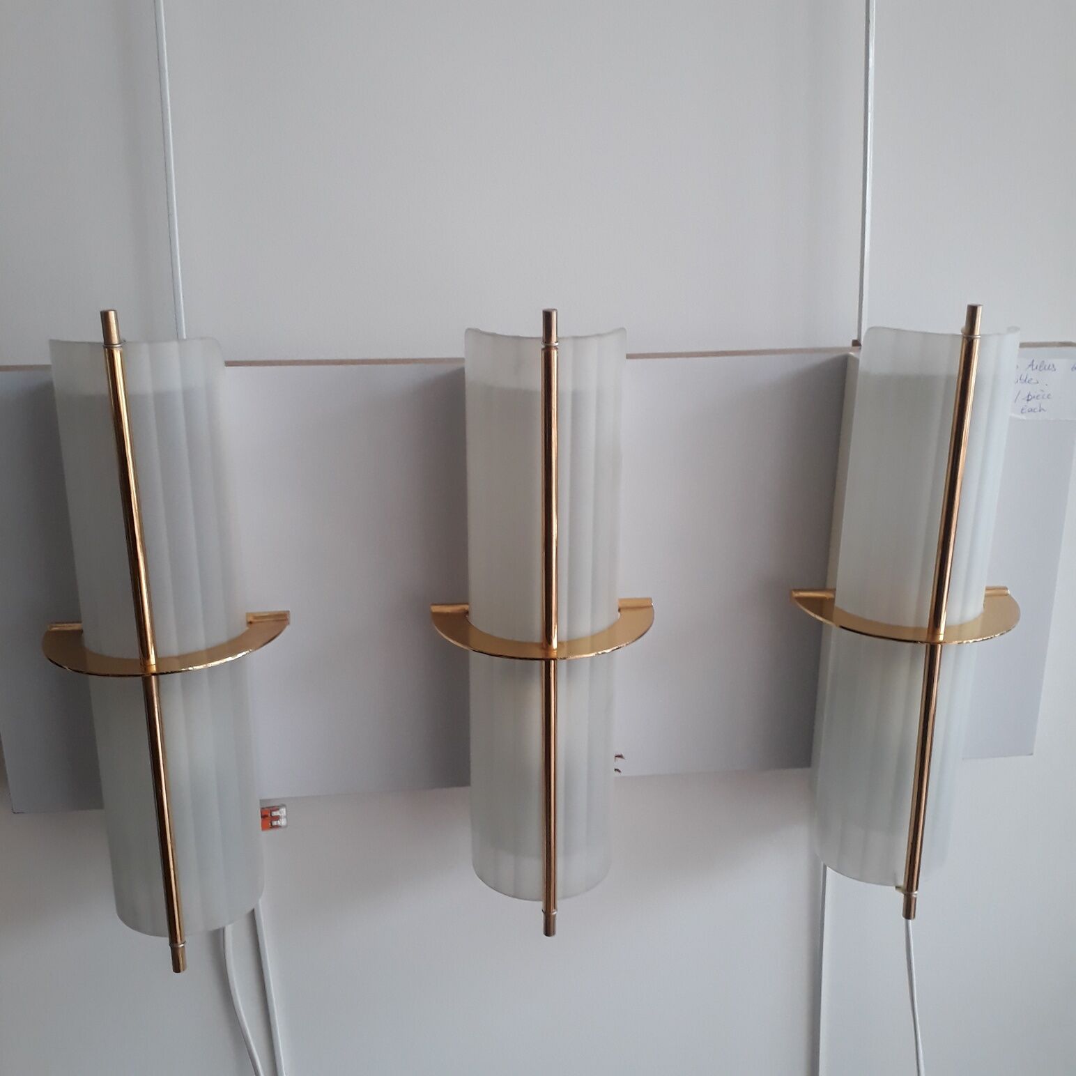 Pair of brass Arlus sconces and shortbread glass