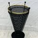 Vintage black perforated metal and brass umbrella stand