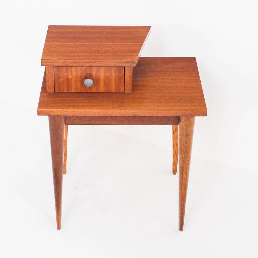 Vintage bedside table. Varnished wood. France, 1960s.