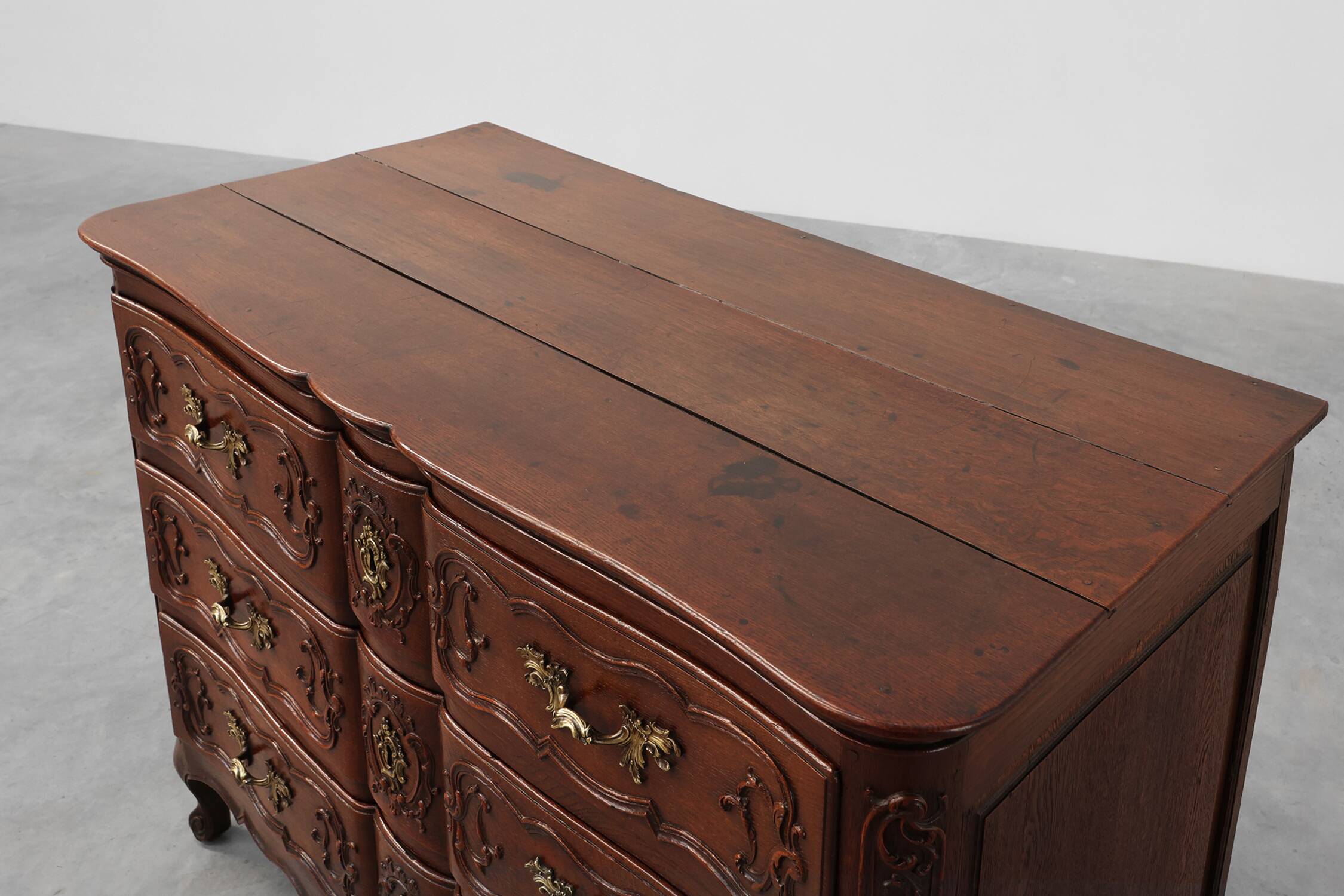 French 18th Century hand crafted oak chest of drawers in Louis XV style