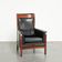 Cow leather Art Deco design armchair with a timeless look