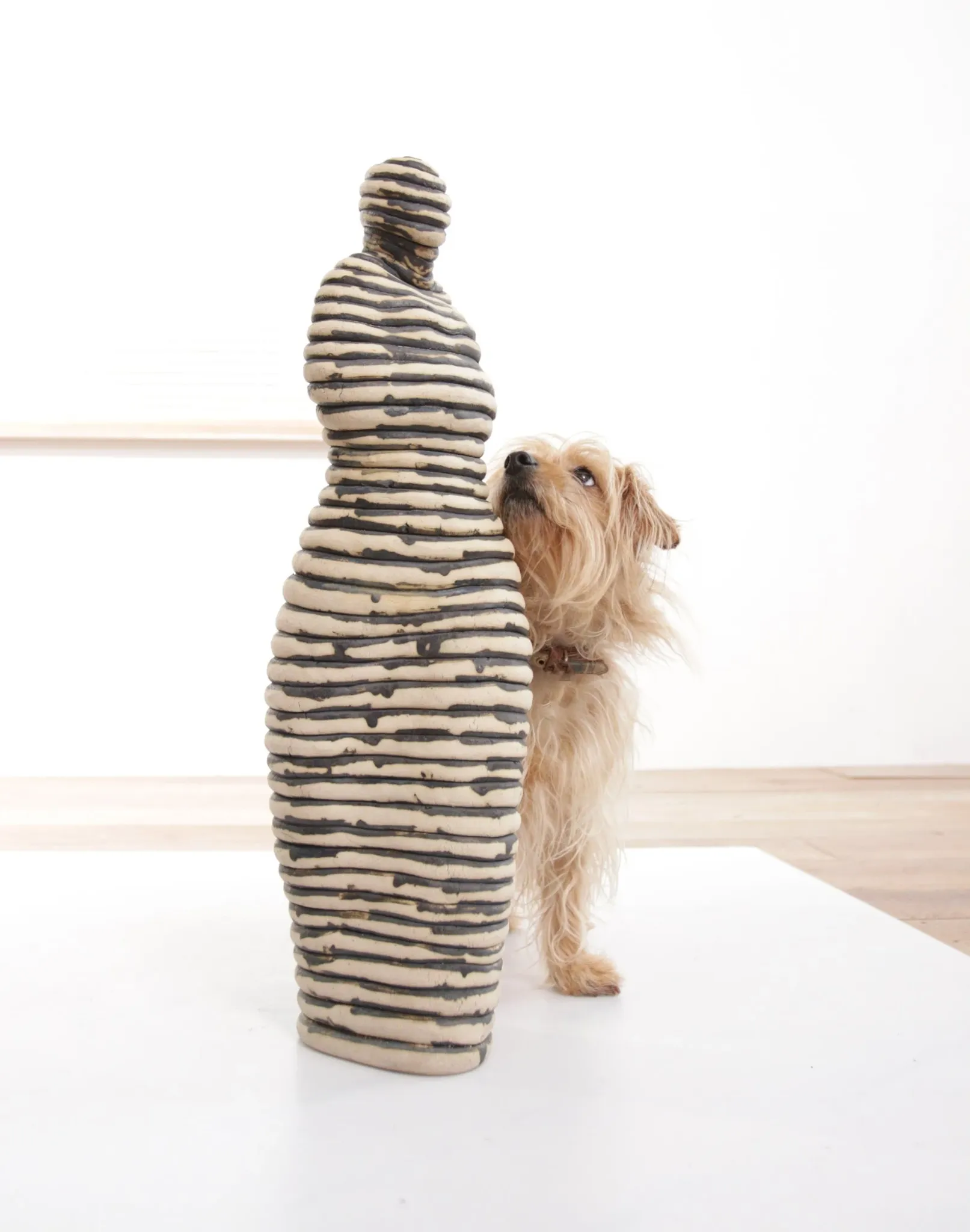 Andrea Dogterom ceramic sculpture women in stripes