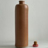 Decorative stoneware bottle.
