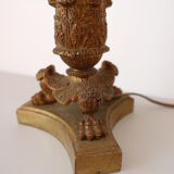 Empire period torch candle holder in bronze tripod base with lion's claws