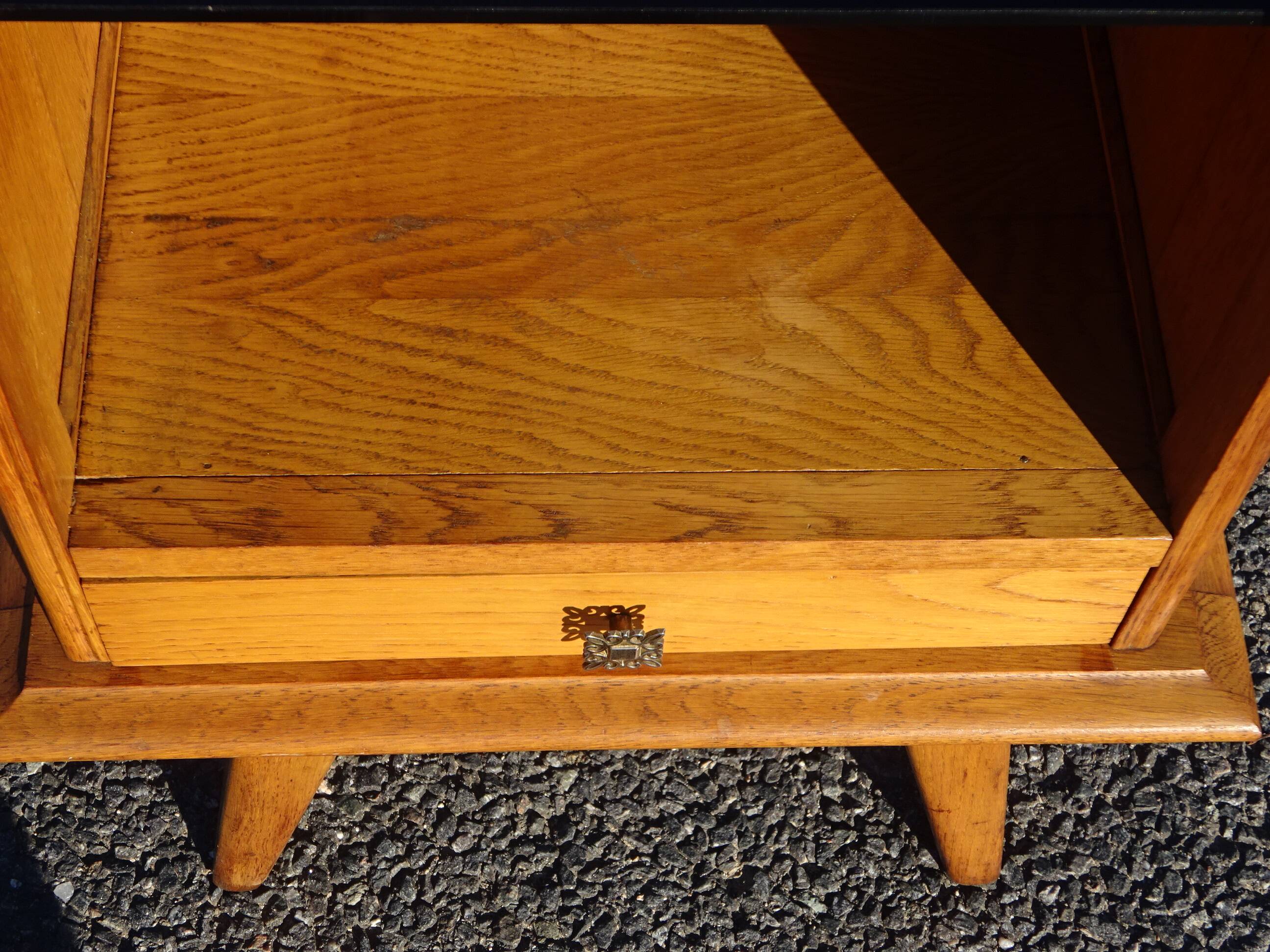 Oak bedside table with tapered legs