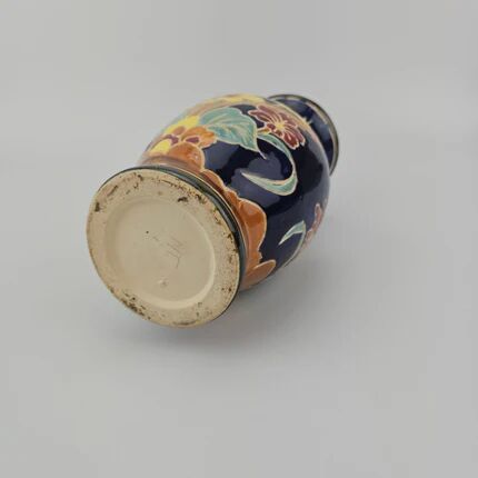 Large multicoloured ceramic vase with floral decoration signed NT.