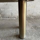 Memphis coffee table in black/gray granite and brushed stainless steel — sculptural double-tiered table in a postmodern 1980s style