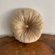 Gold lamé round velvet cushion