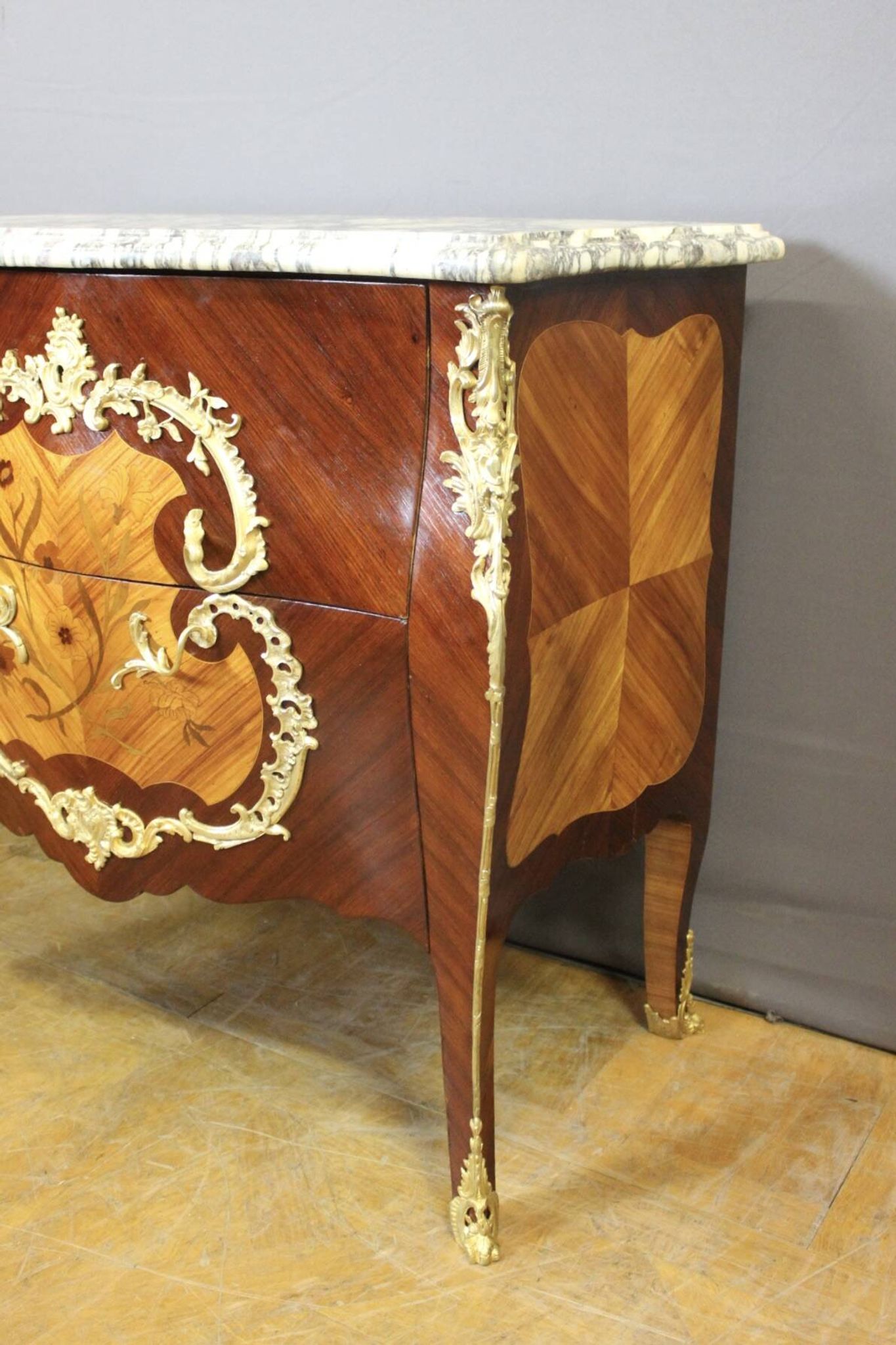 Louis XV style commode in marquetry around 1900